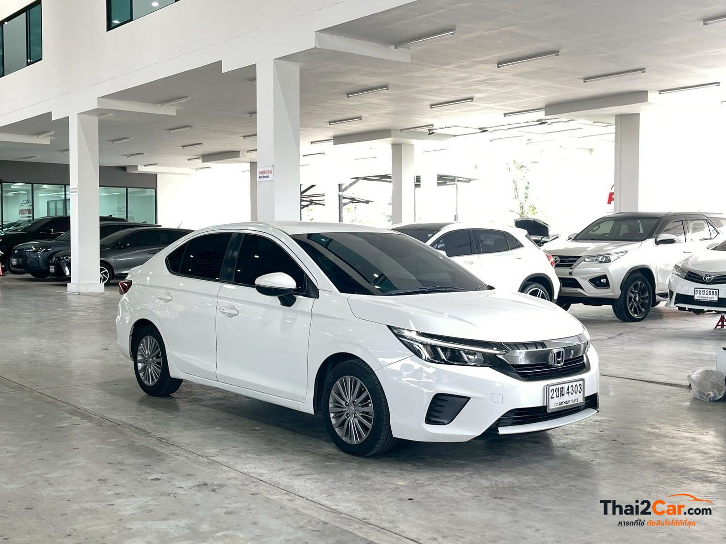 Honda City City 1.0V Sedan เกียร์ AT สีขาว ไมล์ 77,236 กม. ผ่อนเริ่มต้น 6,xxx/เดือน 2021